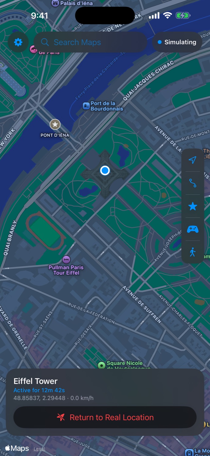 Geovo on iPhone in dark mode, simulating the Eiffel Tower, Paris